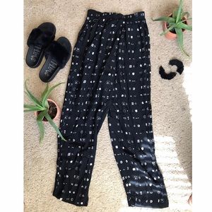 Sold/Cave Man Print Trousers